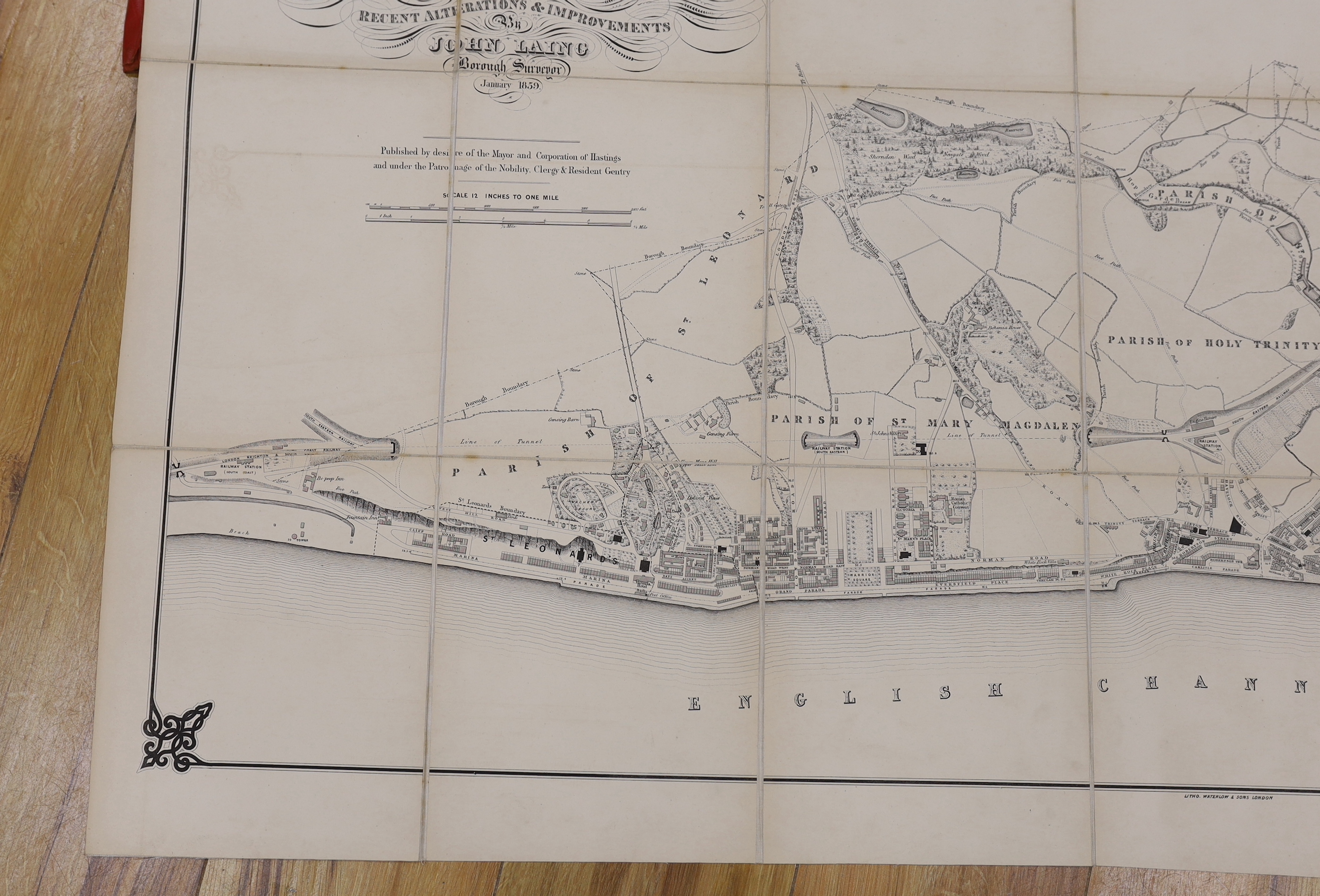 HASTINGS - Laing, John (Borough Surveyor) - Map of Hastings and St. Leonards, on linen in red cloth binding with gilt lettering, scale: 12 inches to 1 mile, Hastings, January 1859, 68.5 x 131cms